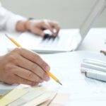 Graphic design and color swatches and pens on a desk. Architectu